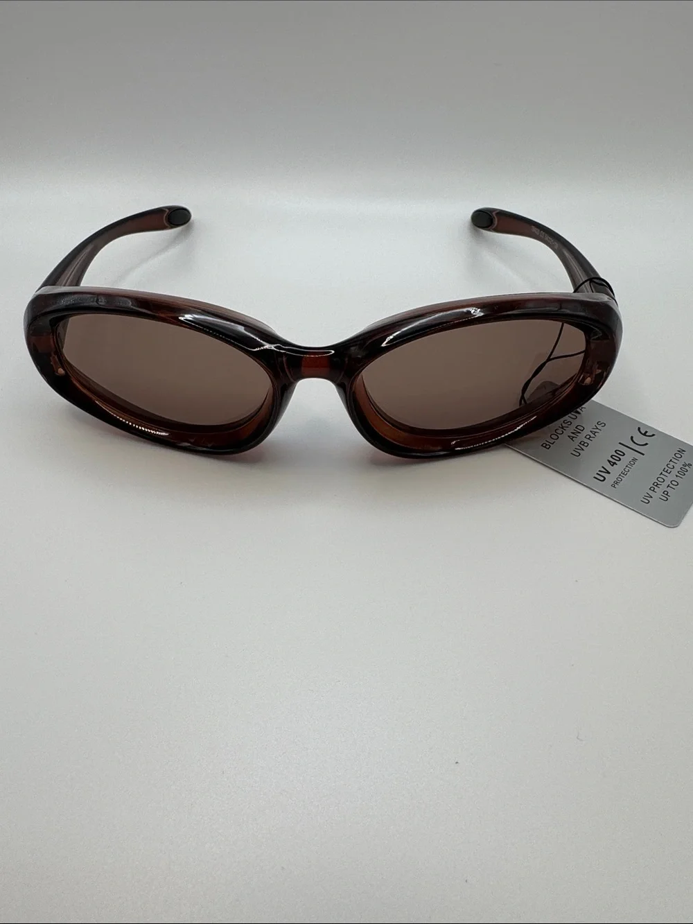 Classic Women’s Oval Brown Sunglasses with Tinted Lenses